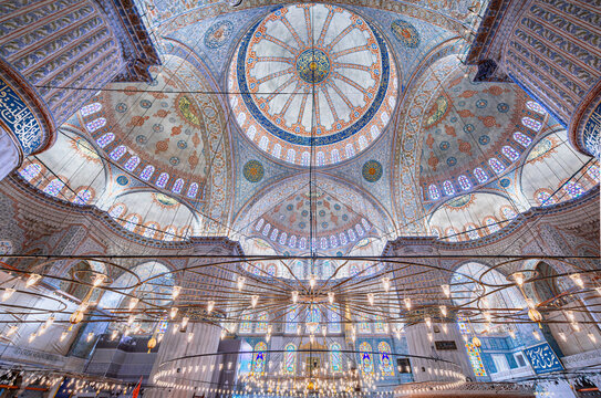 Istanbul, Turkey - November 8, 2023: Ornate interior of Sultan Ahmed or Blue Mosque, majestic Ottoman era historical imperial mosque with blue tiles