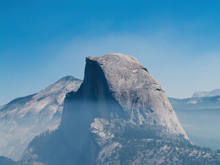 Half Dome In Yosemite National Park California With Smoke