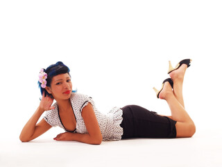 Attractive Hispanic Woman Reclining On White Background