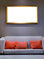 Interior mockup blank cutout transparent picture frame in horizontal hanging on wall with decor bright interior, colorful sofa and backrest pillow or scatter cushion