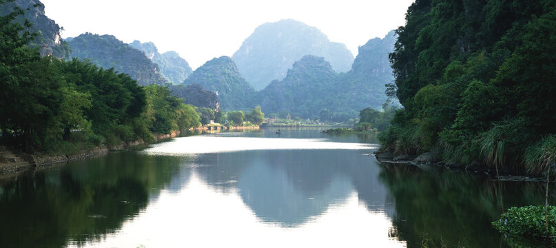 Panorama of the river along karst mountains along Hoa Lu, the ancient capital, in Ninh Binh, Vietnam