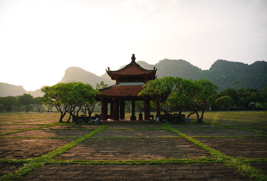 Sunset at the temple of Hoa Lu, the ancient capital, along karst mountains in Ninh Binh, Vietnam