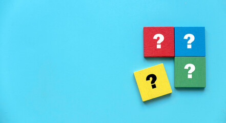 Q&A or questions and answers concept.Multicolor square puzzle with a symbol of question mark. Copy...