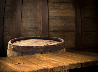 Fototapeta premium background of barrel and worn old table of wood. High quality photo. High quality photo