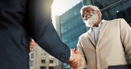 Outdoor, business people and men with handshake, greeting and contract with lens flare, corporate...