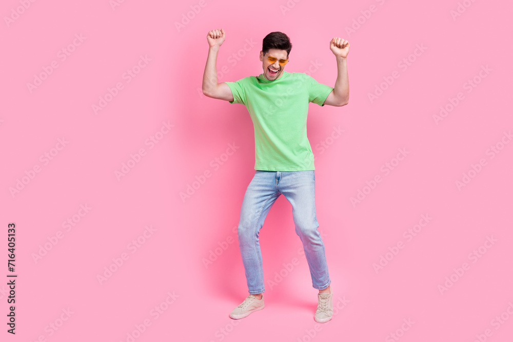 Sticker Full size body photo of crazy disco man enjoy party invite for free alcohol event raised hands up dancer isolated on pink color background