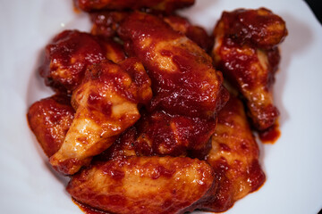  Delicious fried chicken wings in BBQ sauce. Fast junk food