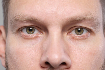 Fototapeta premium Closeup view of man with beautiful eyes