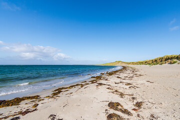 A view of Liniclate beach on the Isle of Benbecula in the Outer Hebrides in Scotland.
