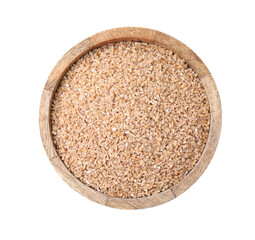 Dry wheat groats in bowl isolated on white, top view