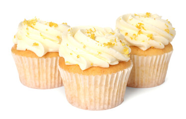 Delicious cupcakes with cream and lemon zest isolated on white