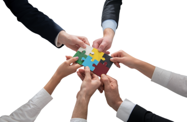 businessmen working together to build a puzzle as teamwork, partnership and integration concept
