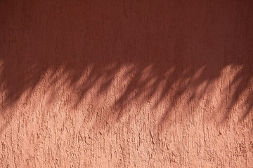 terracotta background with shadow overlay
