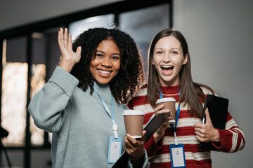 happy smiling business woman waved to greet colleagues at office.