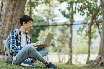 Students Reading Books In University Campus, summer vacation.