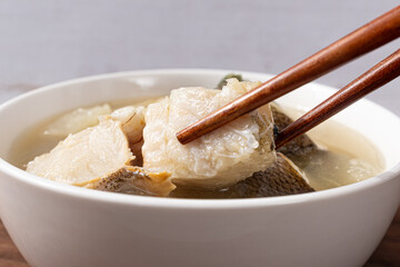 Soup dish with cod, radish and vegetables