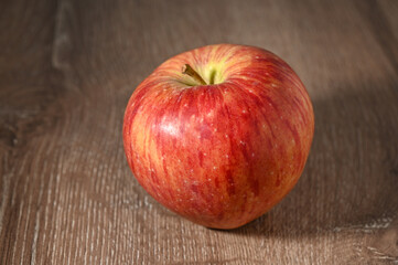 red apples on a wooden table 2