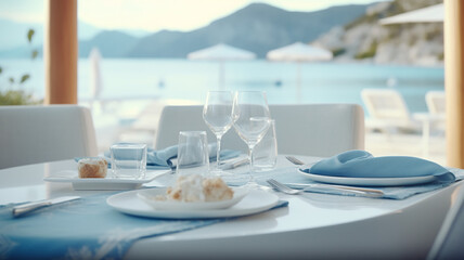 Fototapeta premium table setting in the restaurant interior light blue tones mediterranean style