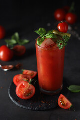 A glass with cold bloody mary cocktail