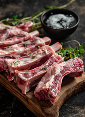 raw pork chops with rosemary