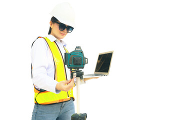 Female foreman engineer in sunglasses holds laptop computer set up and examines modern technology tools, laser level and vertical marker (plum bob) on easel at construction site on white background