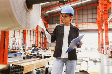 Female inspection engineer inspects the quality of plastic rolls, galvanized sheets, metal sheets...