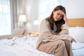 Asian woman holding and touching on head feel suffering head ache pain flu high fever, alzheimer,...