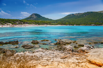 The coastal environment and crystal waters in Cala Agulla beach