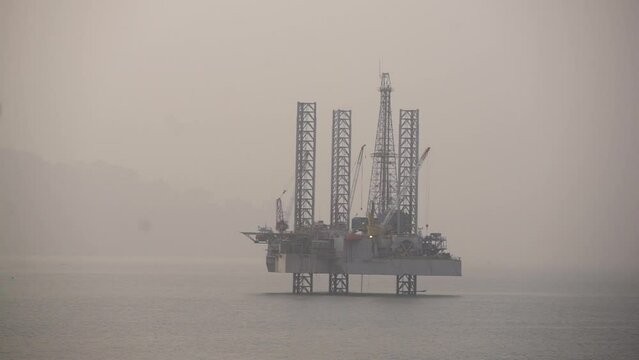Oil drilling rig at sea
