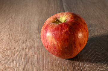 red apples on a wooden table 11