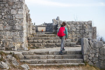 Female Person Hiker Discovery the Ruins of Saint Valentin Church on Mount Sabotin, Nova Gorica...