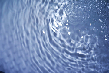 Blue water texture. Bubbles and bubbling water.