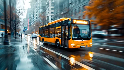  an old yellow / orange bus is driving on a city streets.  - Motion blur at night. © Lisanne