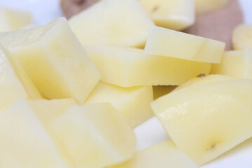 boiled chopped potatoes. potato with selective focus. meal details.