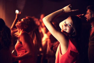 Music, woman and portrait at festival with dancing for party, concert and nightclub with happiness...
