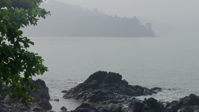 Beach with rocks at sunset in Cameroon, Africa
