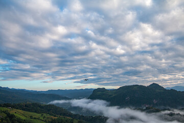 Fototapeta na wymiar beautiful mountain mist sky scenery