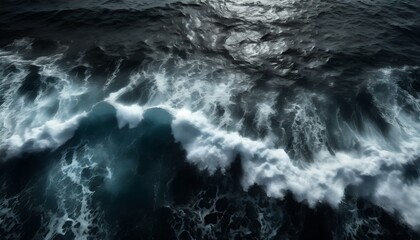 top view of sea waves black water background texture