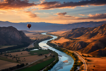Fototapeta premium Colorful hot air balloons flying over landscape. Sky adventure travel.