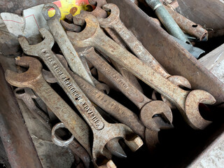 Vintage spanners in an old toolbox