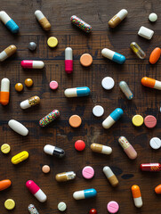 Different pills and medication on a table 