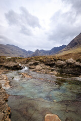 Naklejka na ściany i meble Ethereal Beauty of Fairy Pools Under the Majestic Skye Mountains