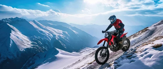 Foto op Aluminium Motocross rider on the race on a snow-covered track. Motocross. Enduro. Extreme sport concept. © John Martin