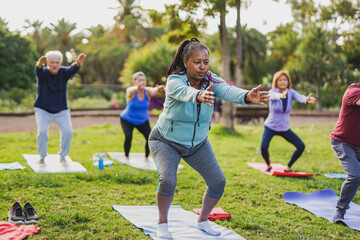 Fit multiracial senior people doing yoga exercise at city park - Mental health concept - Powered by Adobe