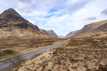 Fototapeta na wymiar A serene drive through majestic Glencoe valleys