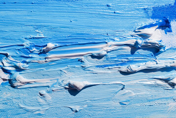 Blue and white oil paint strokes with texture. Abstract sea background hand drawn. Stock photo.