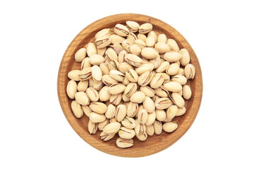 Salted pistachios for beer isolated on white background. Healthy delicious pistachios in wooden plate.