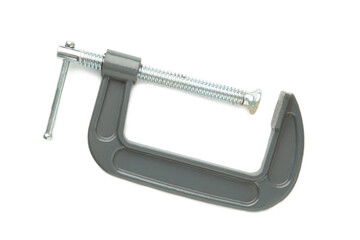 Clamp - professional tool for clamping objects isolated on a white background.