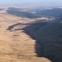 relaxing on the edge of pen y fan mountain