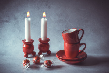Candles and red cups waiting for Christmas